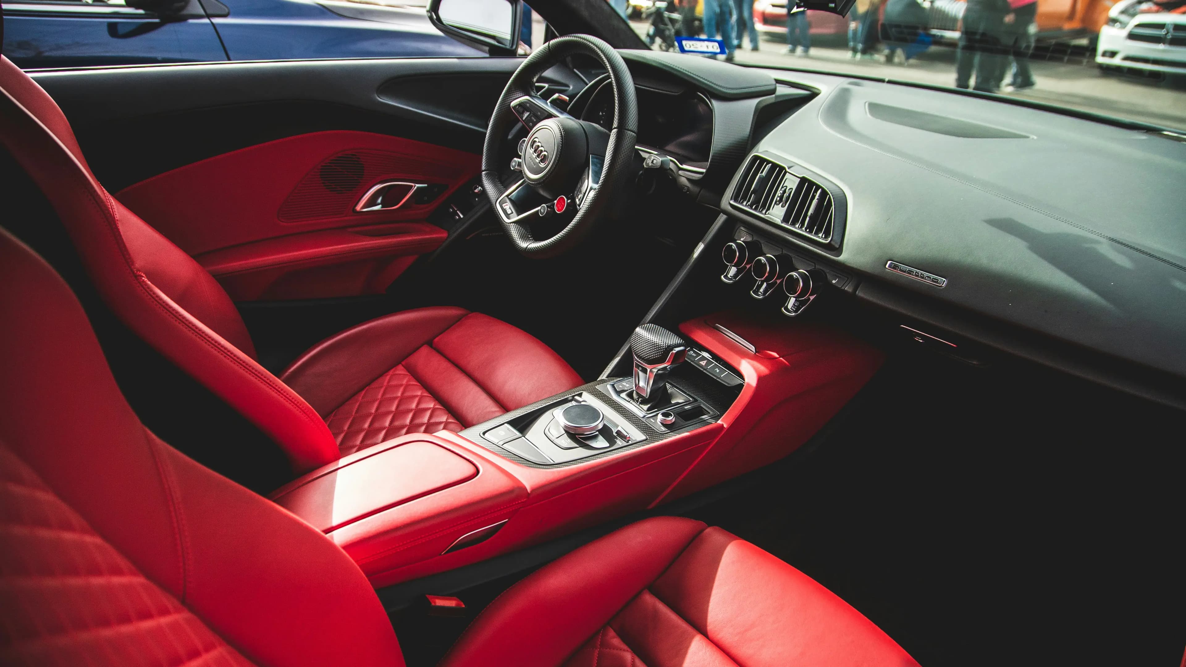 Custom orange leather vehicle interior upholstery
